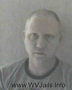  Charlie Devaney` Arrest